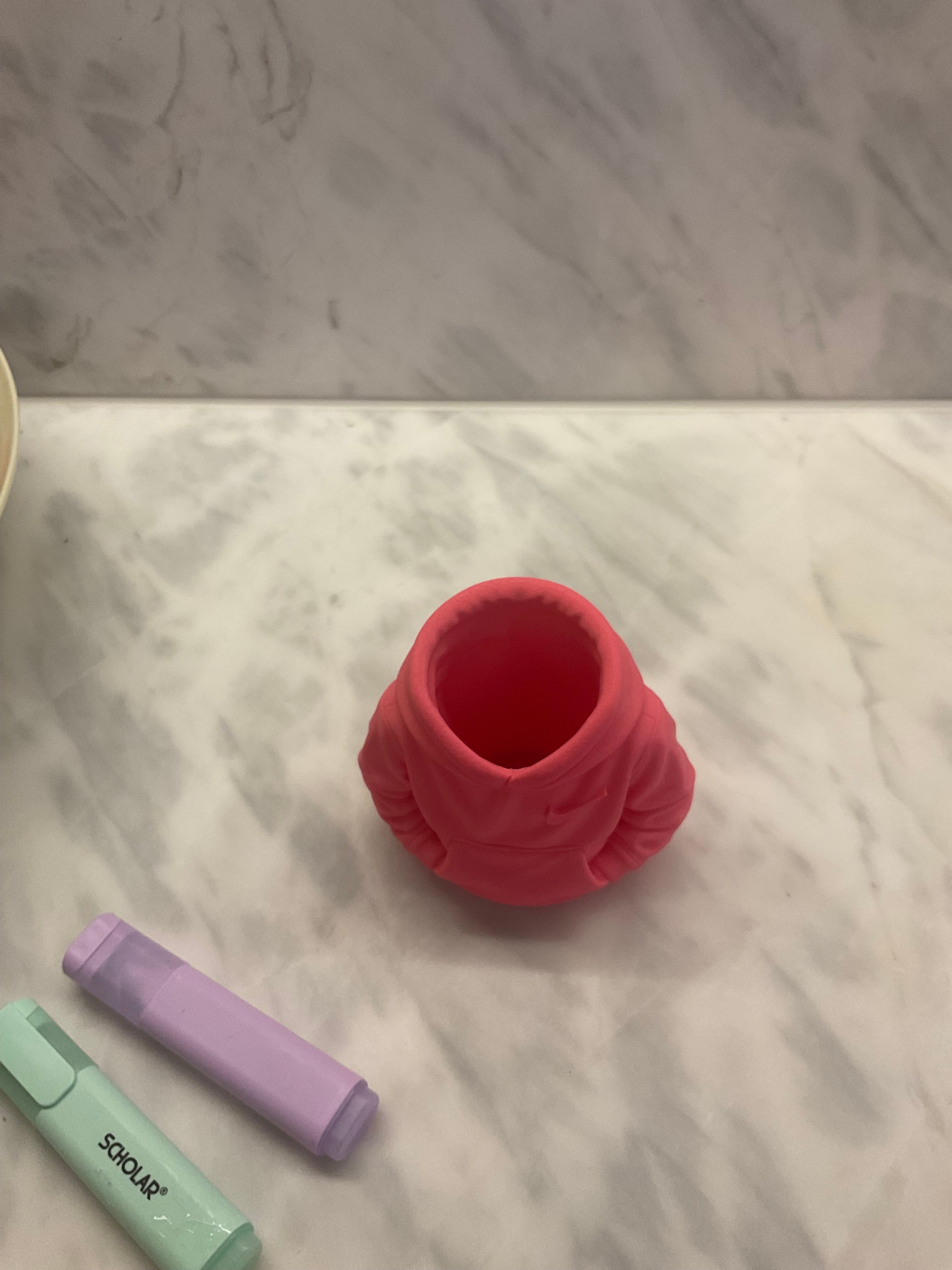 Hoodie pen or toothbrush holder